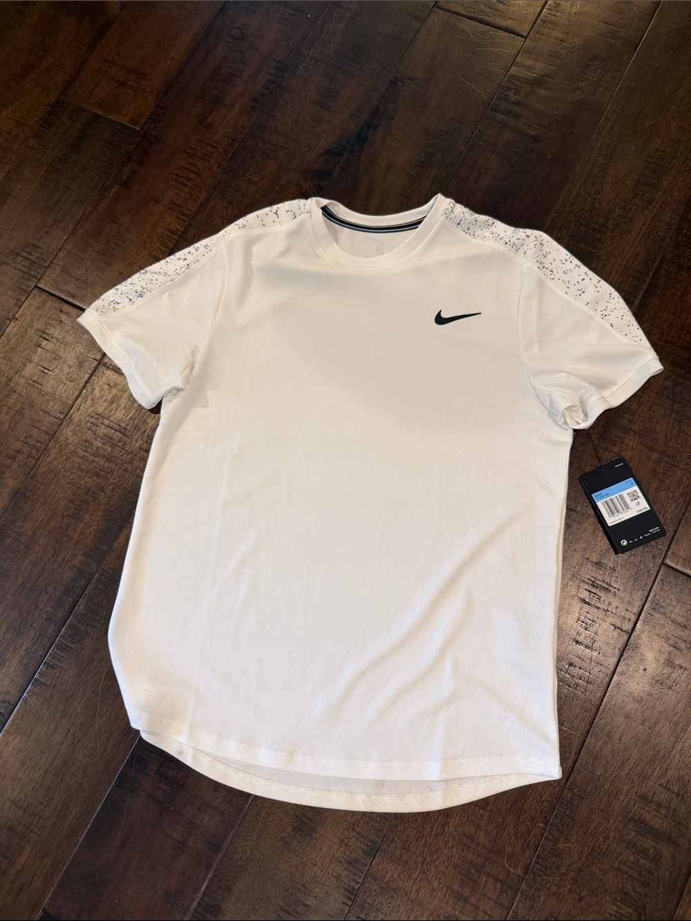 Nike White Short-Sleeve Performance Tee with Black Swoosh